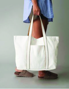 W952 white canvas tote bag with long handles, shown in lifestyle setting – wholesale accessory
