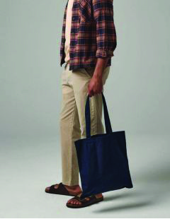Westford Mill W201 Premium tote bag in navy carried by a male model - wholesale accessory